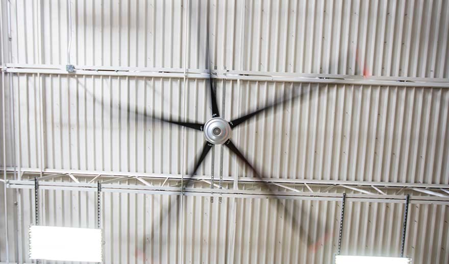 HVLS fan in motion in a warehouse.